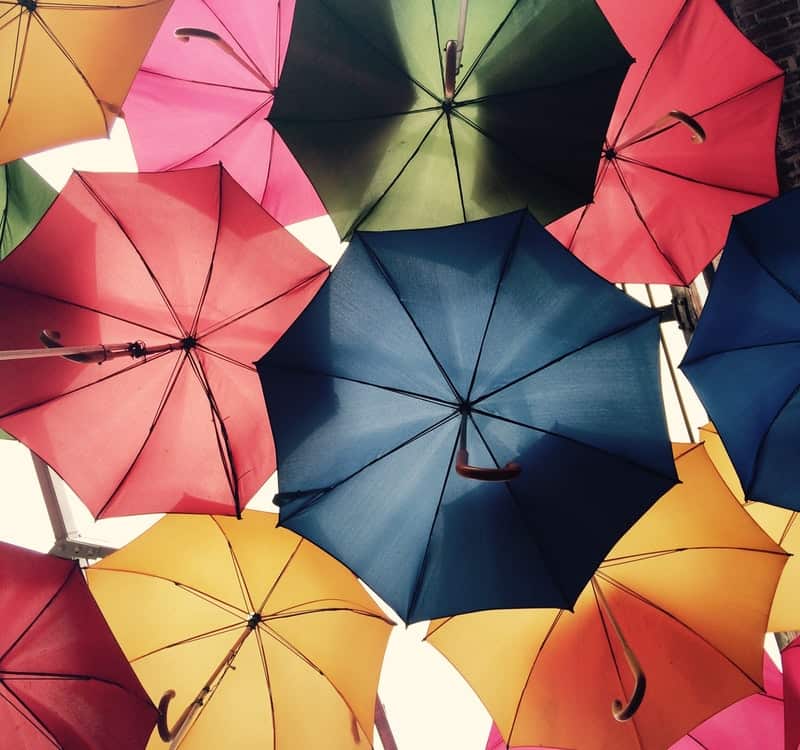 Different multi-coloured umbrellas.
