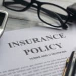 insurance-policy-page-on-desk